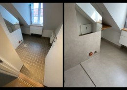 Renoveringen har transformeret rummet fra et ældre design til et stilrent og moderne udtryk med microcement